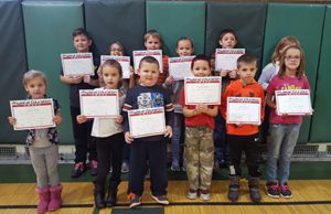 PE Students of December holding their certificates