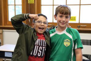 students wearing green